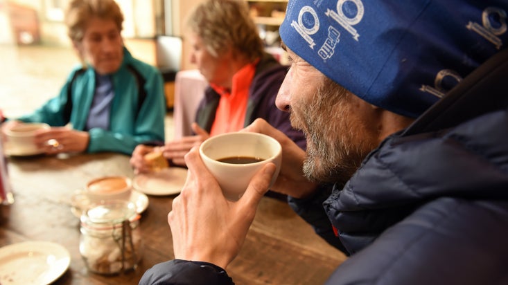 People sat around a table enjoying some hot drinks at Nostell Priory and Parkland, Yorkshire
